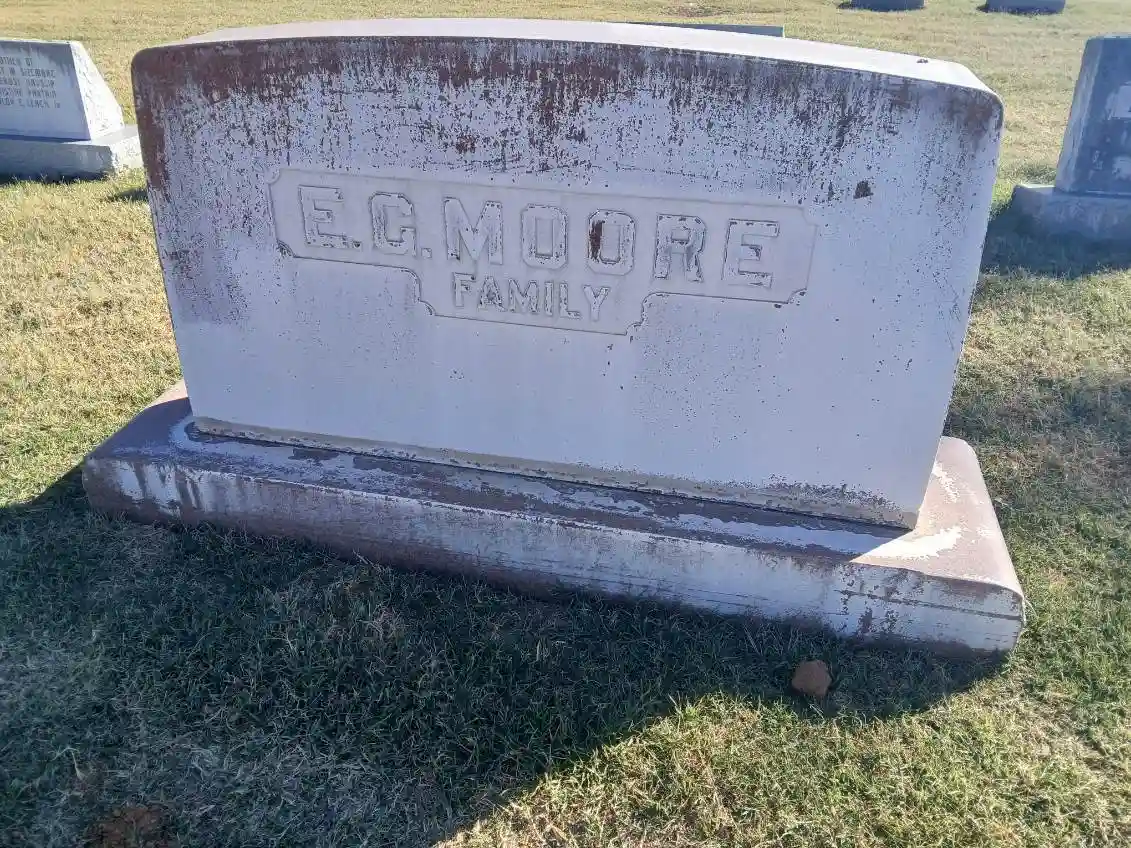 E.G. Moore family headstone before cleaning
